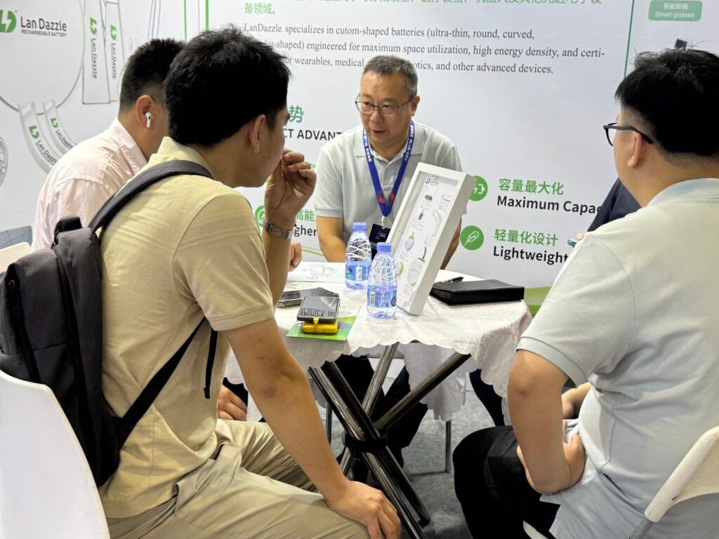 LanDazzle at CIBF2026: Advancing Custom Battery Solutions 2 landazzle team introducing battery with customer 1