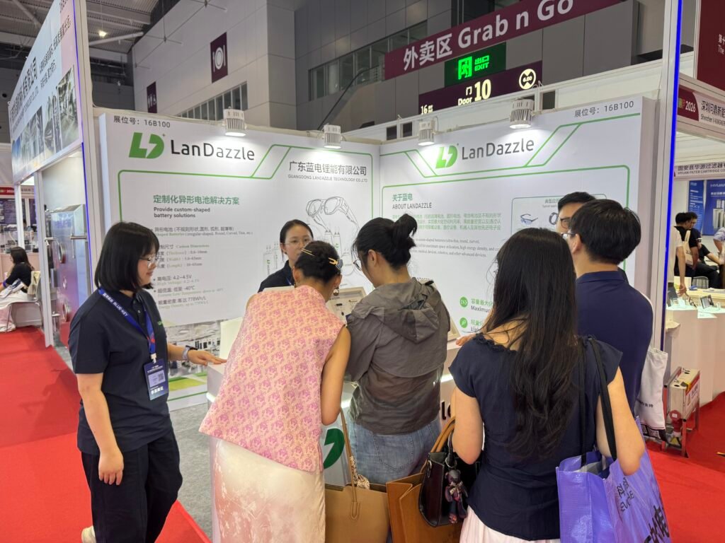 LanDazzle at CIBF2026: Advancing Custom Battery Solutions 4 landazzle team introducing battery with customer 1